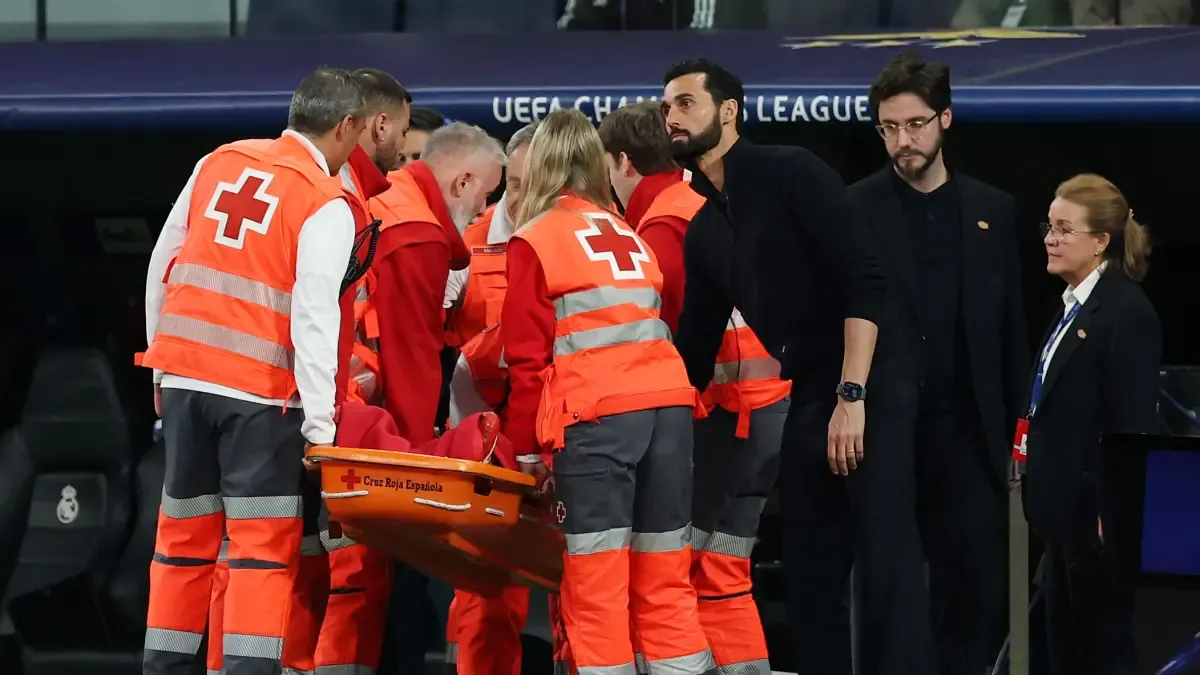 Real Madrid’s Defensive Scare: Raul Asencio Hospitalized After Champions League Collision